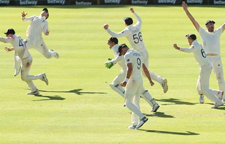 The England players celebrate wildly after winning the second test. (Reuters photo)
