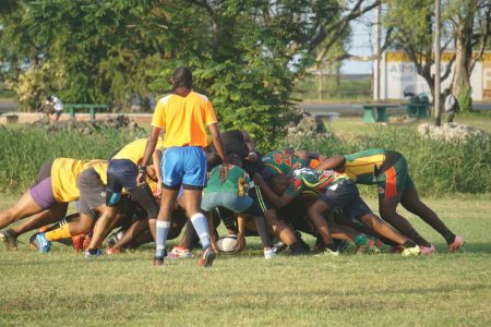 The local 2020 rugby season kicked off  yesterday at the National Park with a 15s matchup involving players from North and South Georgetown. (Emmerson Campbell photo)