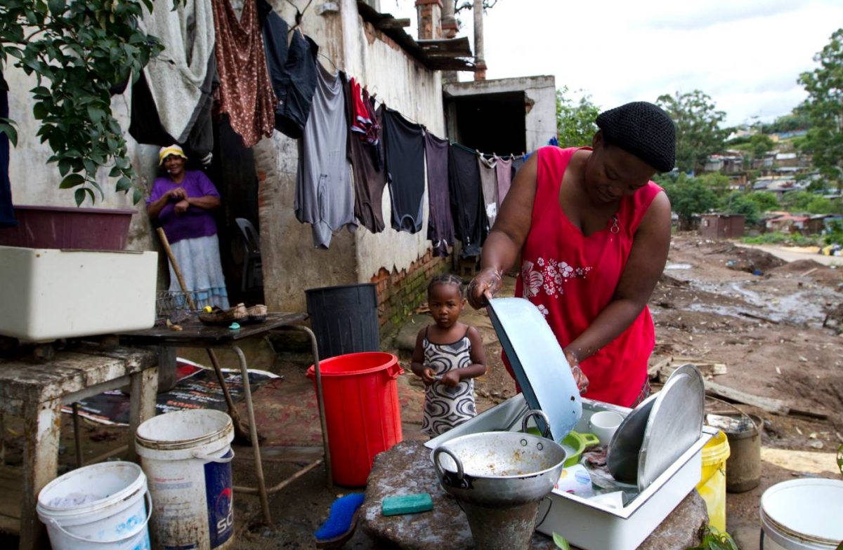 File photo: A woman washing her dishes in Durban, South Africa in 2011. REUTERS/Rogan Ward