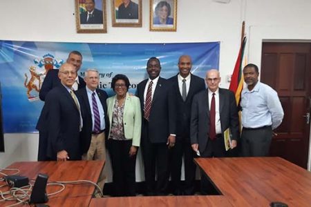 Virginia Senator Richard Black (3rd from left) poses with Minister Cathy Hughes (fifth from right) and the delegation in the ministry’s Colgrain House boardroom. (Ministry of Public Telecommunications photo)
