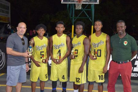Flashback-The victorious Victory Valley Royals Kobe Tappin [2nd left], Delroy Belle [3rd left], Shemroy Green [4th left] and Immanuel LaRose [5th left] posing for the cameras after winning the GABF 3x3 Championship. Also in the photo is GABF President Michael Singh [left] and GABF 3x3 Coordinator Junior Hercules [right]