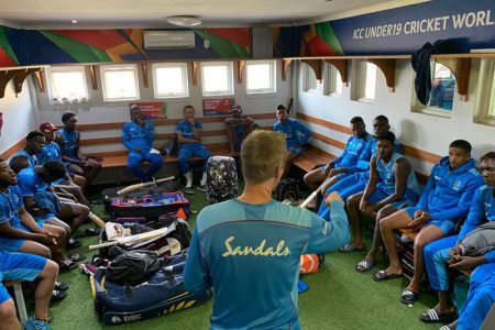 Young West Indies head coach Graeme West gives a pep talk to his charges ahead of their all-important quarterfinal clash against New Zealand today.
