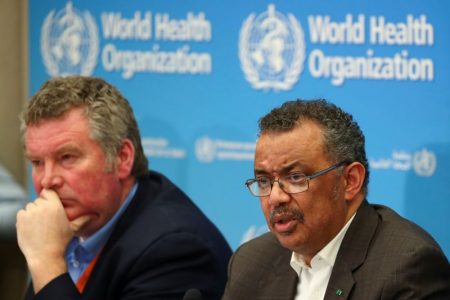 Director-General of the World Health Organization (WHO) Tedros Adhanom Ghebreyesus speaks next to Michael J. Ryan, Executive Director of the World Health Organization (WHO) Health Emergencies Programme during a news conference after a meeting of the Emergency Committee on the novel coronavirus (2019-nCoV) in Geneva, Switzerland January 30, 2020. REUTERS/Denis Balibouse