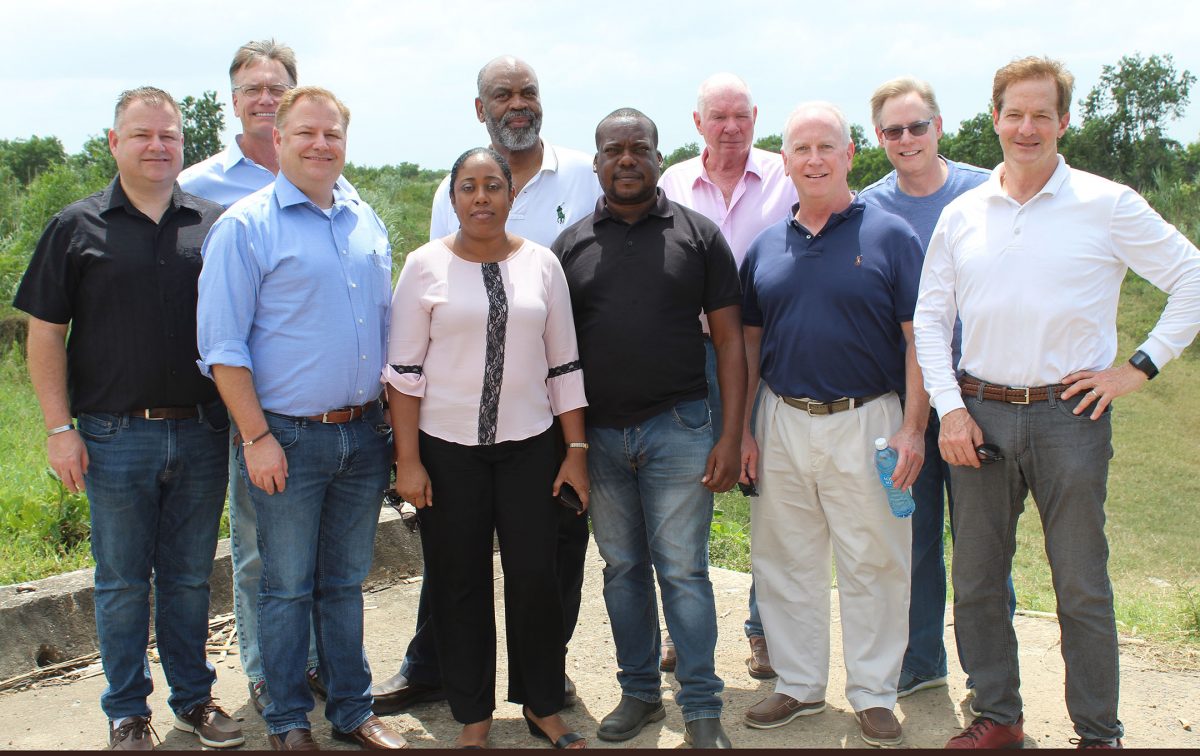 US-based businessman Edmond Braithwaite (5th from left) and some of the members of an investment team he recently brought here. Mike Elliott is 3rd from left.