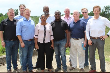 US-based businessman Edmond Braithwaite (5th from left) and some of the members of an investment team he recently brought here. Mike Elliott is 3rd from left.