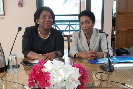 Valerie Odle of the CARICOM Secretariat and Chief of Mission Cynthia Combie-Martyr (at right) during the media briefing