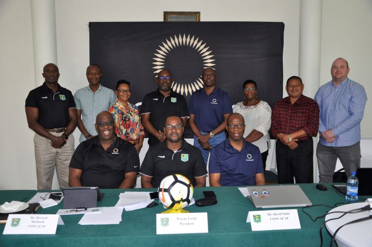 Members of the GFF Executive Committee posing with One CONCACAF Programme and Special Projects Coordinator within the Caribbean Howard McIntosh [sitting at left], and General Secretary of the Bermuda Football Association David Sabir [sitting at right], following the conclusion of the CONCACAF Executive Mentorship Programme at the Pegasus Hotel, Kingston.
