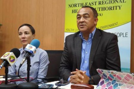 Health Minister Dr Christopher Tufton addresses journalists at a press conference in Ocho Rios, St Ann, on Friday. To his right is Foreign Affairs and Foreign Trade Minister Kamina Johnson Smith. (Jamaica Gleaner photo)
