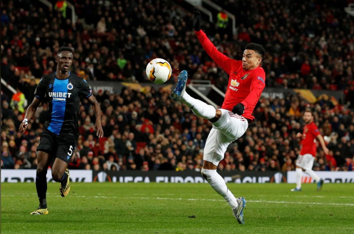 Club Brugge’s Odilon Kossounou in action with Manchester United’s Jesse Lingard. (REUTERS/Phil Noble)
