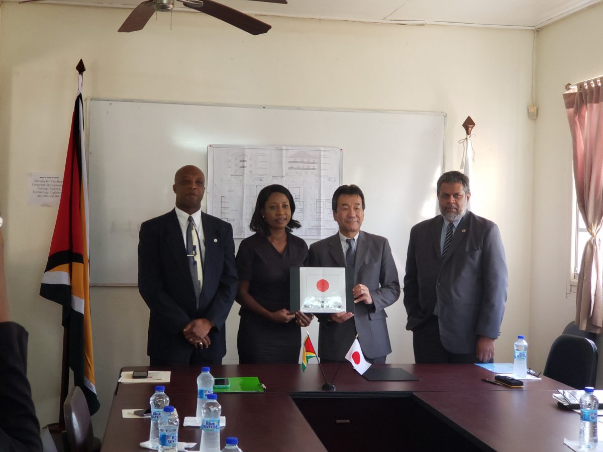 From left are Director of the International Cooperation Department at the Ministry of Foreign Affairs Forbes July, CEO of VYC Goldie Scott, Ambassador Tatsuo Hirayama and Honorary Consul General for Japan in Guyana Kashir Khan after the signing on Friday