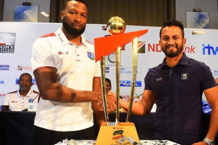 West Indies captain Kieron Pollard and Sri Lanka’s skipper DimuthKarunaratne with the trophy at stake in the ODI series.

