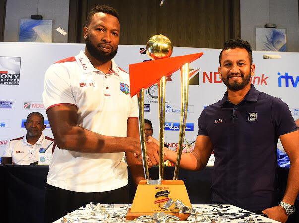 West Indies captain Kieron Pollard and Sri Lanka’s skipper DimuthKarunaratne with the trophy at stake in the ODI series.
