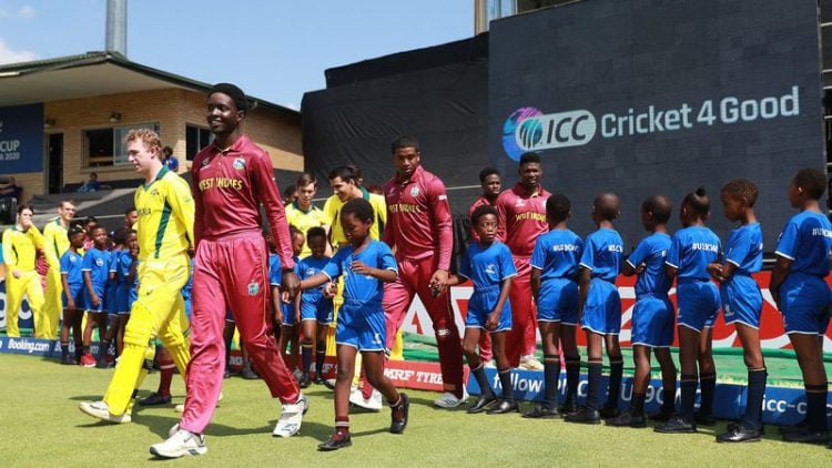 The Australia and West Indies teams take the field for their fifth place match which was eventually rained out.