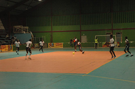 Scenes from the hard-fought clash between Leopold Street (black) and Rio All-Stars (white) at National Gymnasium in the Magnum Tonic Wine Mashramani Cup Futsal 