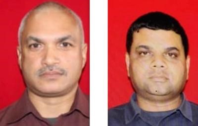 Acting Inspector Rajesh Gookool, 47, and Acting Sergeant Richard Lalbeharry,