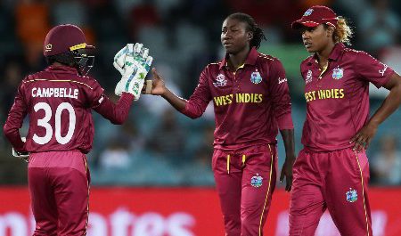 A despondent West Indies celebrate a rare success against Pakistan yesterday.
