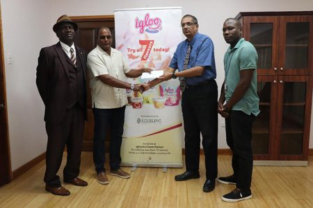 Chief Executive Officer of Sterling Products, Ramsay Ali (second from right) hands over the sponsorship to Assrodeen Shaw in the presence of the Club’s PRO Guy Griffith (extreme left) and Manager, Dellon Lynch (extreme right).
