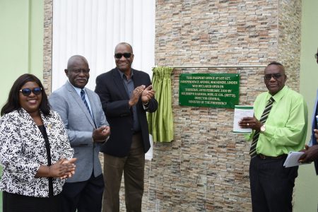 Director General of the Ministry of the Presidency, Joseph Harmon (third from left) with Minister of Foreign Affairs, Dr. Karen Cummings (left) , Minister of Citizenship, Winston Felix (second from left) and Regional Chairman, Renis Morian at the opening of the office. (Ministry of the Presidency photo)