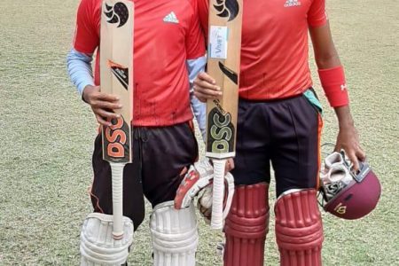 (l-r) Arshad Ali (58 not out) and Richie Looknauth (50 not out and 2-12) forged an unbroken century stand for CI.
