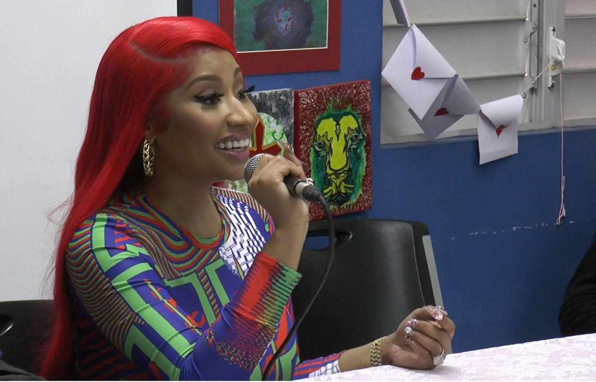 Trinidad-born rapper Nicki Minaj speaks to children at the St Jude’s Home for Girls in Belmont yesterday.