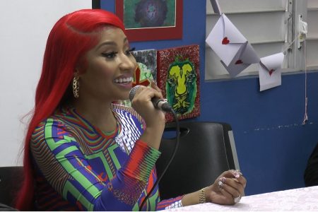 Trinidad-born rapper Nicki Minaj speaks to children at the St Jude’s Home for Girls in Belmont yesterday.