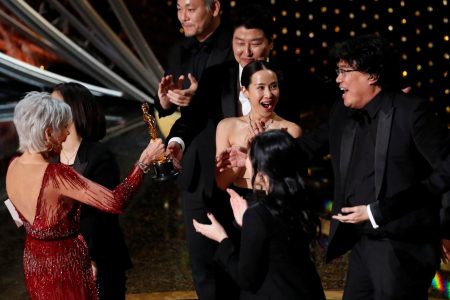 Kwak Sin Ae and Bong Joon Ho win Oscar for Best Picture for "Parasite" at the 92nd Academy Awards in Hollywood, Los Angeles, California, U.S., February 9, 2020. REUTERS/Mario Anzuoni