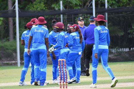 The West Indies Women players celebrate the fall of a wicket in yesterday’s third warm up fixture against Pakistan. (Photo courtesy CWI)
