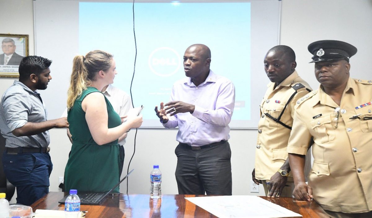 Consultant Steph Wood (second from left) interacting with Chief Transport Planning Officer, Patrick Thompson