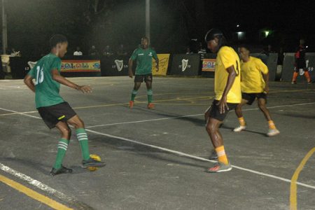Flashback-Scenes from the Swag Entertainment [yellow] and Amelia’s Ward Russians semi-final encounter in the Guinness ‘Greatest of the Streets’ Linden Championship at the Christianburg hardcourt.