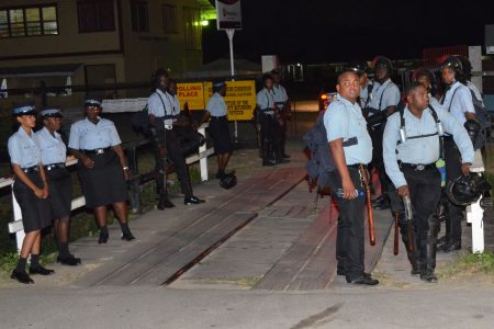 Police ranks as they lined the bridge leading to the Mon Repos Primary School 