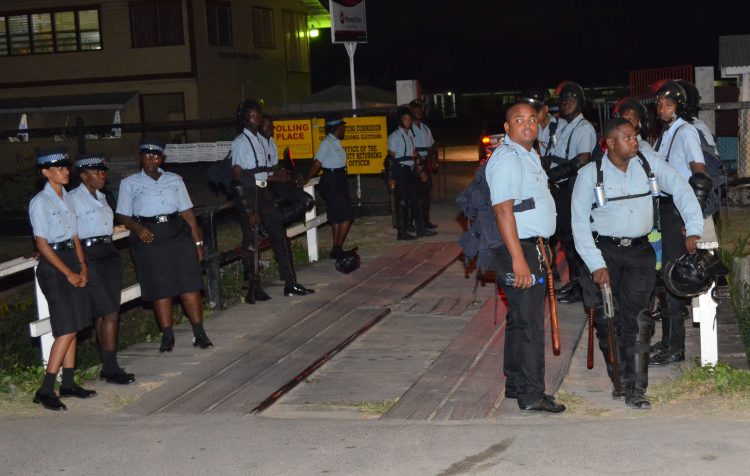 Police ranks as they lined the bridge leading to the Mon Repos Primary School 