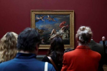 Visitors look at Titian’s ‘The Rape of Europa’ painting at a media preview of Titian: Love Desire Death exhibition at the National Gallery in London, Britain March 12, 2020. (REUTERS/Simon Dawson)