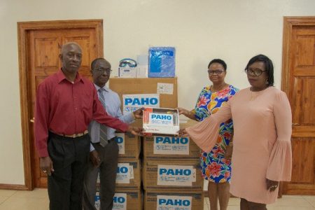 From left are Coordinator of the Health Emergency Operations Centre Dr Collin James, PAHO/WHO Country Representative Dr William Adu-Krow, Minister of Public Health Volda Lawrence and Permanent Secretary of the Ministry of Public Health Colette Adams (Department of Public Information photo)