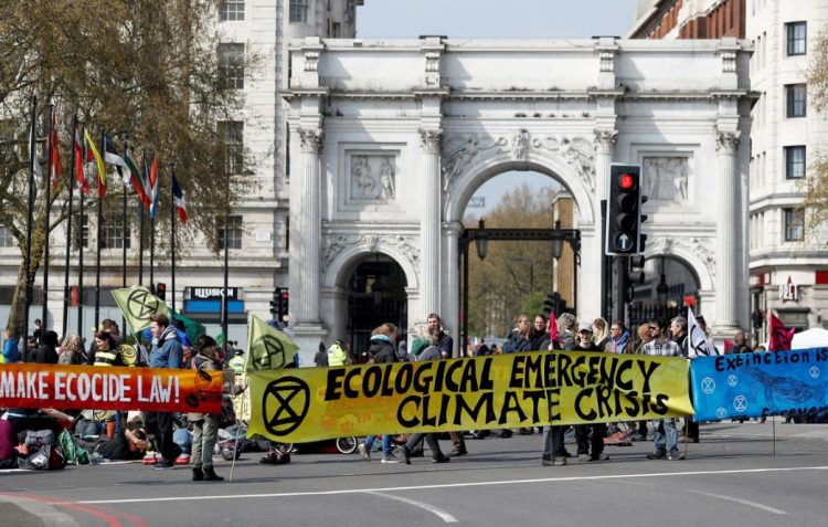 Supporters at an Extinction Rebellion protest
