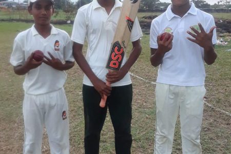 From left, Sachin Balgobin (4-20), Avesh Persaud (46) and Nityanand Mathura (5-17)
