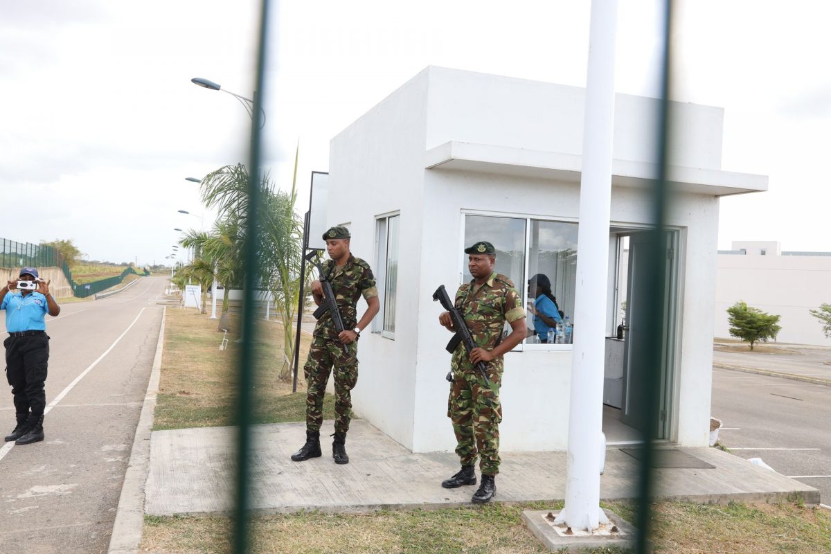 Soldiers guard the Couva Hospital where the 40 new COVID-19 cases from Camp Balandra were taken on Saturday.