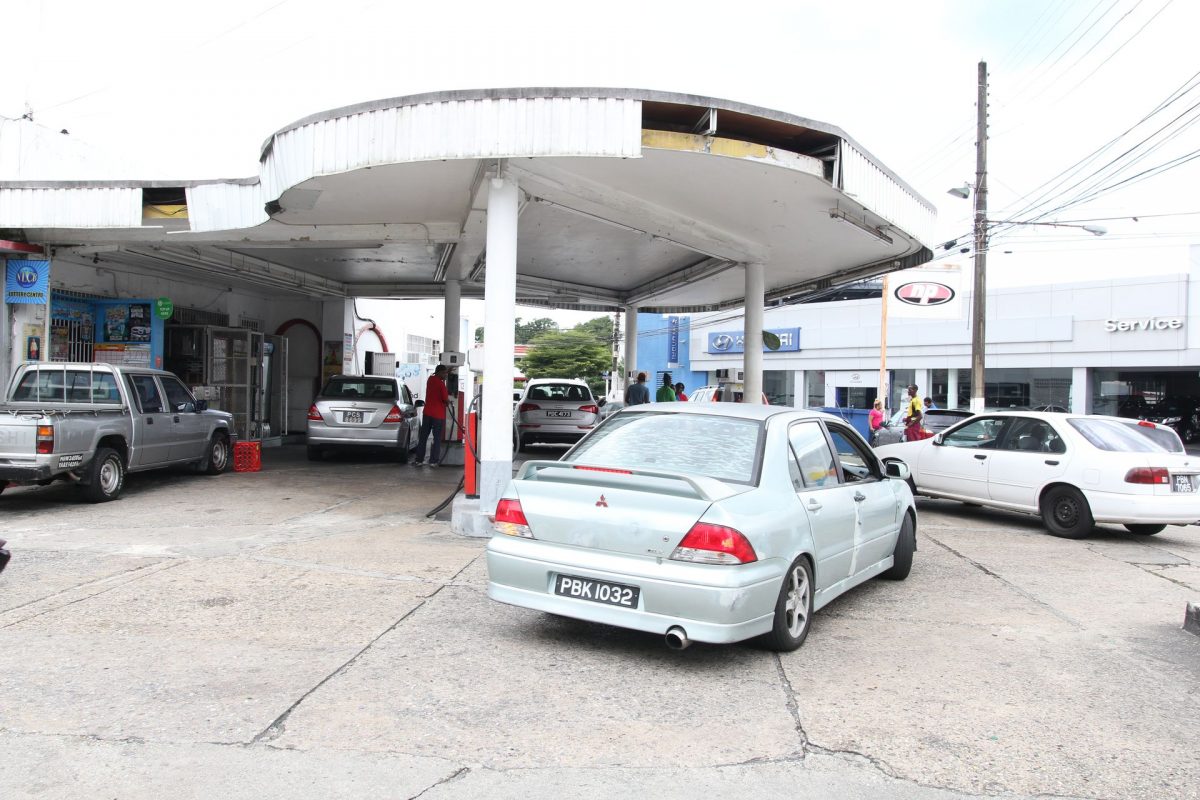 Drivers wait to fill gas at the station on Richmond Street, Port-of-Spain, on Friday.
