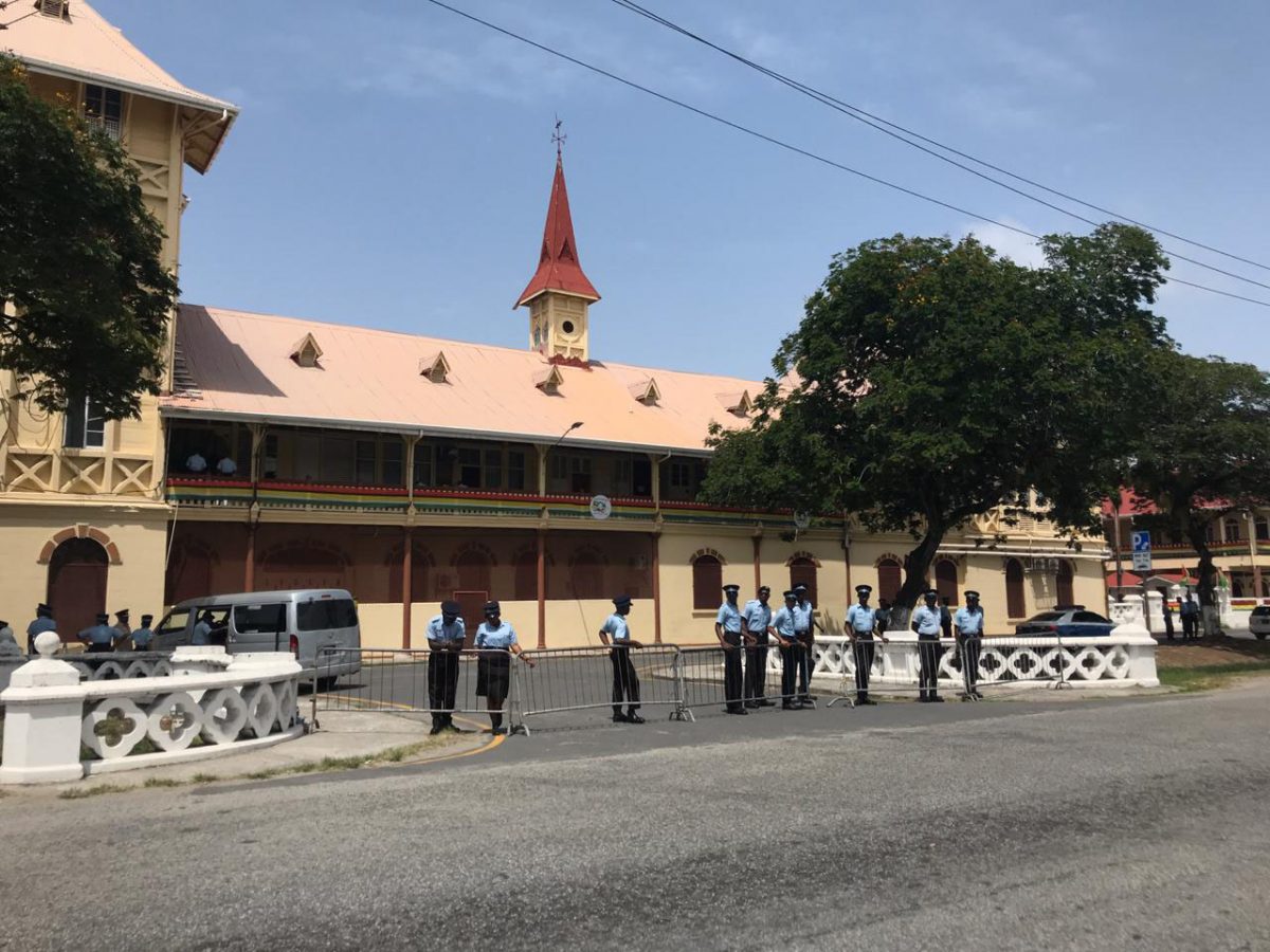 Members of the police force positioned at security barriers around the  High Court yesterday for Chief Justice Roxane George-Wiltshire’s ruling on whether the court had jurisdiction to hear the Region Four vote count suit. 