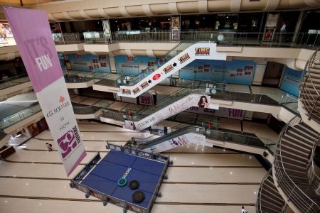 A view of an empty shopping mall is seen after Gujarat state government banned public gatherings to avoid the spreading of the coronavirus, in Ahmedabad, India, March 16, 2020. REUTERS/Amit Dave/File Photo