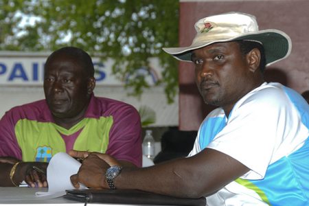 Former West Indies and Guyana all-rounder Carl Hooper, right, who once served as Sagicor batting coach wants to coach a T20 team. At left is Roddy Estwick.