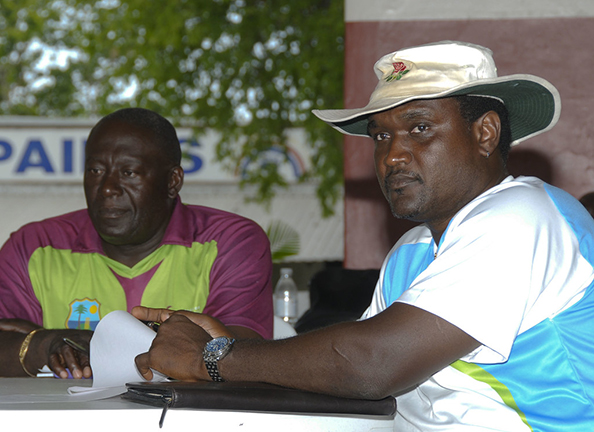 Former West Indies and Guyana all-rounder Carl Hooper, right, who once served as Sagicor batting coach wants to coach a T20 team. At left is Roddy Estwick.