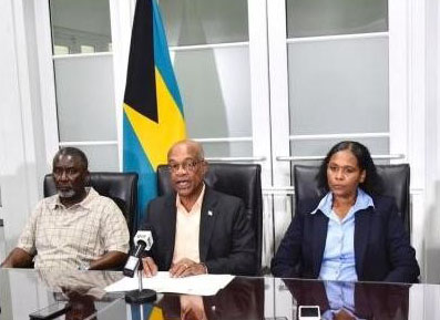 Acting Minister of Health the Hon. Jeffrey Lloyd (centre) announced that a 61-year-old female resident of New Providence who does not have relevant travel history is the first confirmed person with COVID-19 in The Bahamas during a press conference at the Ministry of Health, Sunday, March 15, 2020. 