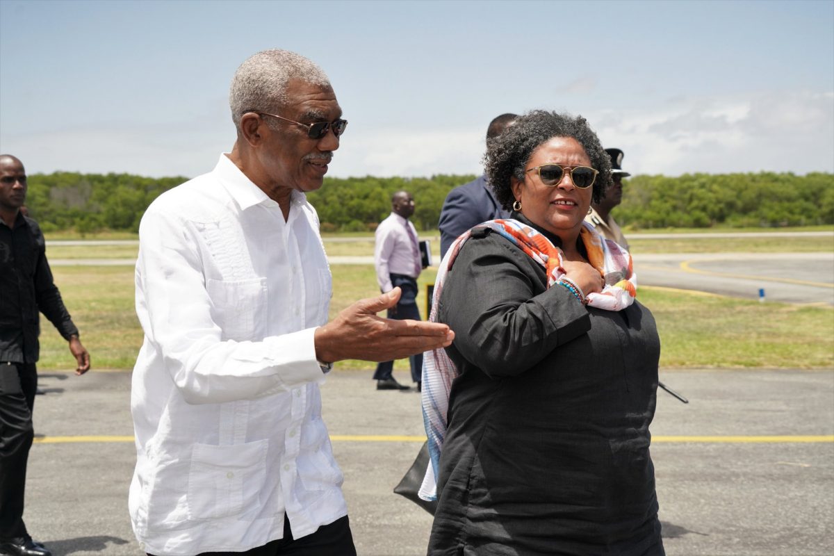 This Ministry of the Presidency photo shows President David Granger and Prime Minister Mia Mottley shortly after her arrival.