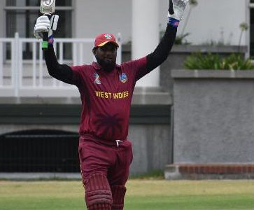 West Indies’ Over 50 player, Azad Mohammed, celebrates reaching three figures against Canada although the match was subsequently called off.

