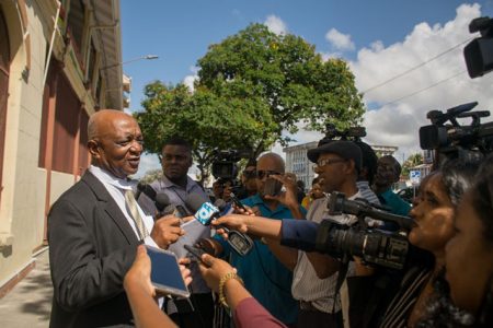 Senior Counsel Neil Boston addressing members of the media outside the Supreme Court yesterday. (Department of Public Information photo)