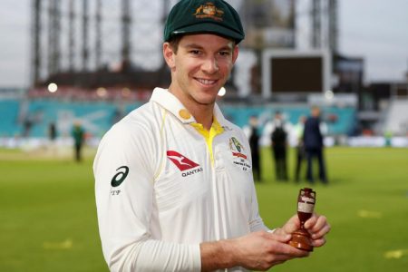 FILE PHOTO: Cricket - Ashes 2019 - Fifth Test - England v Australia - Kia Oval, London, Britain - September 15, 2019 Australia’s Tim Paine celebrates with the Ashes urn after drawing the series to retain the Ashes Action Images via Reuters/Paul Childs
