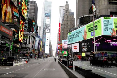 A message about protecting yourself from the coronavirus disease (COVID-19) is seen on an electronic billboard in a nearly empty Times Square in Manhattan in New York City, New York, U.S., March 20, 2020. REUTERS/Mike Segar