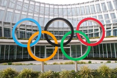 FILE PHOTO: The Olympic rings are pictured in front of the International Olympic Committee (IOC) in Lausanne, Switzerland, March 17, 2020. REUTERS/Denis Balibouse