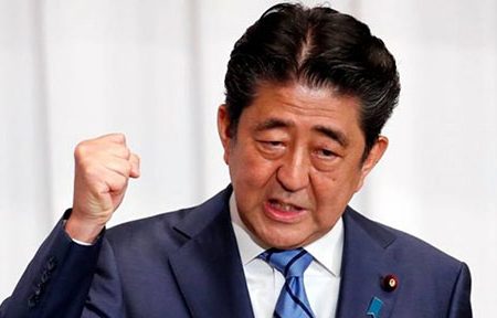 Japan’s Prime Minister Shinzo Abe, above, is adamant that the 2020 Olympic Games in Tokyo will go ahead as planned.