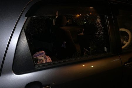 The vehicle with the smashed window
